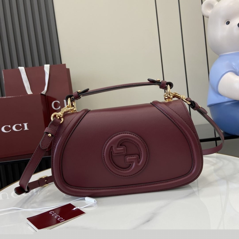 G*u*i top handle bags